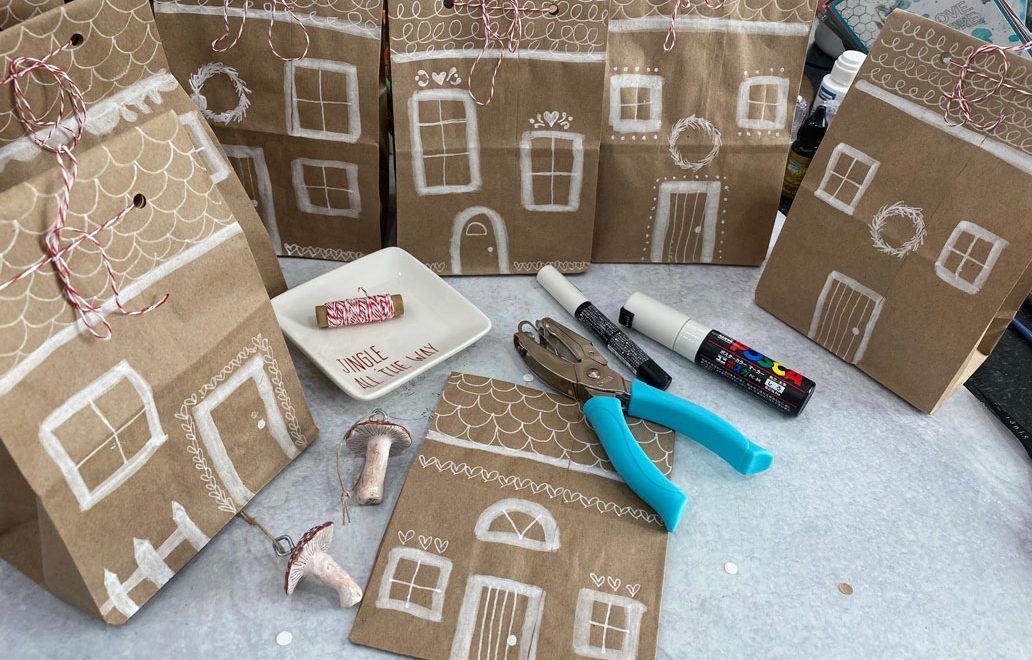 Multiple bags decorated like gingerbread houses.