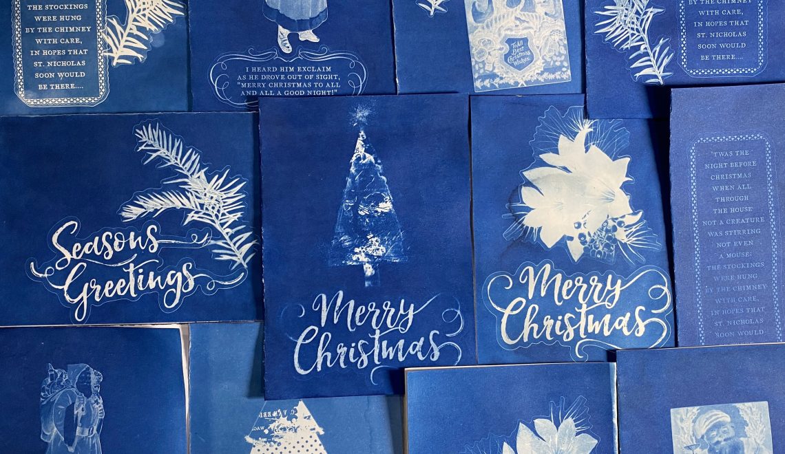 Cyanotype cards printed with various christmas and holiday messages